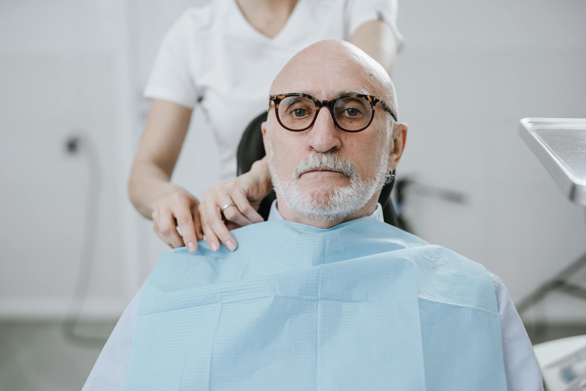 Senior at dental vision and hearing checkup