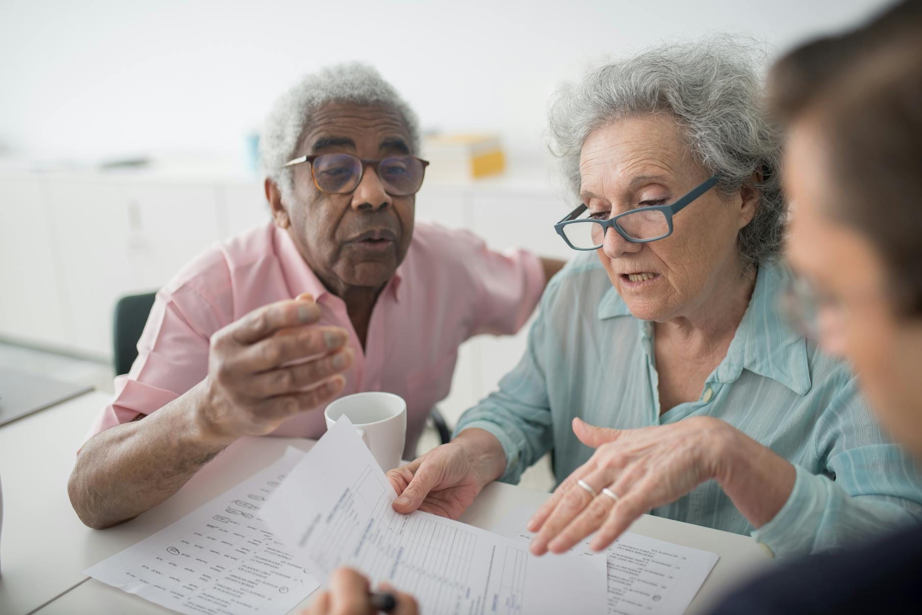 Senior reviewing Medicare appeal paperwork