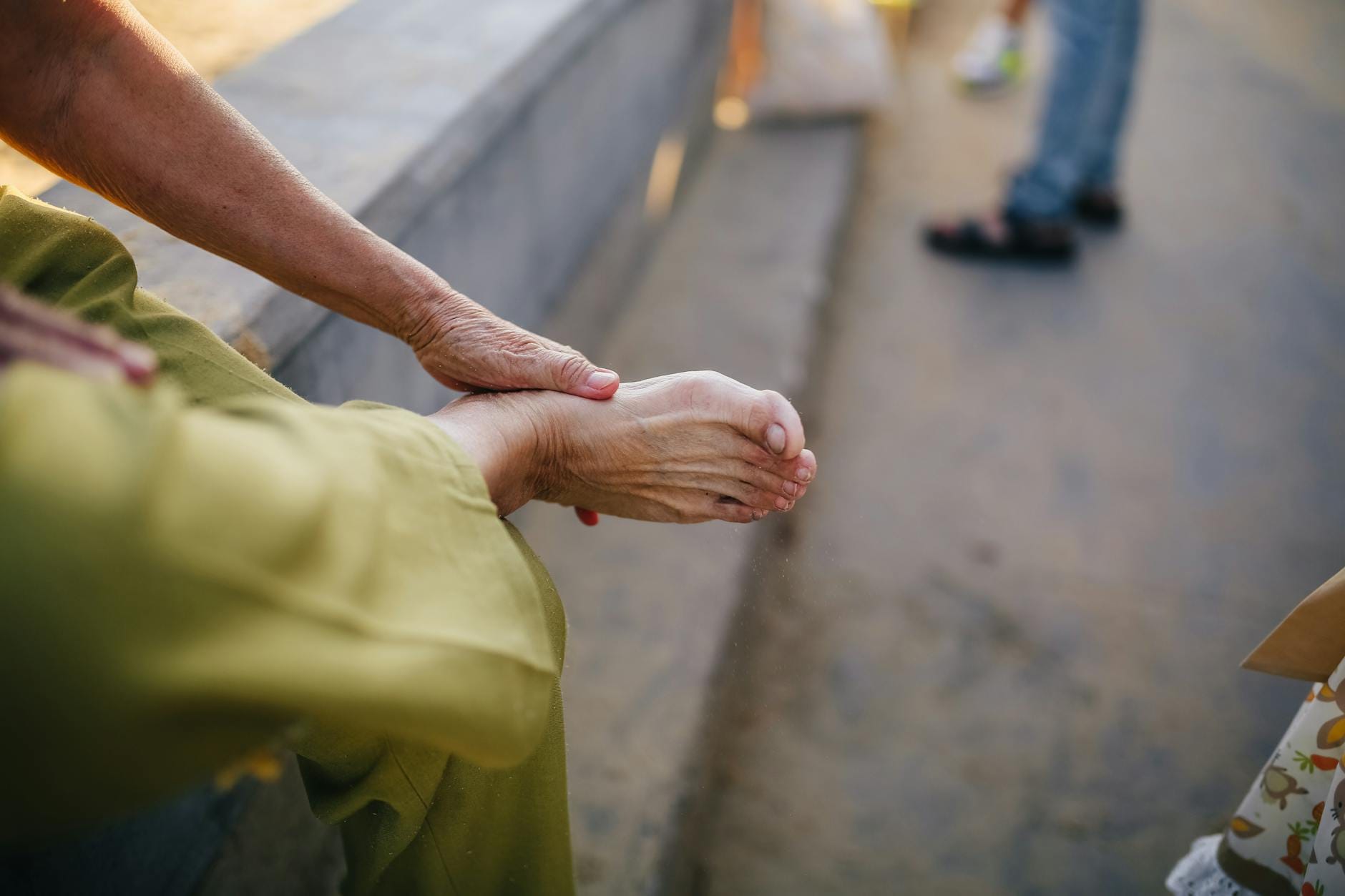 Senior with foot neuropathy pain relief