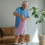 Elderly senior doing morning balance exercises