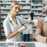 senior receiving shingles Shingrix vaccine from pharmacist in 2026