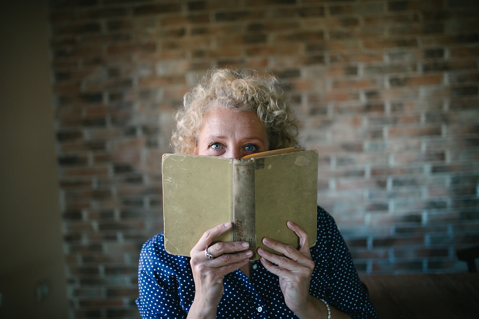 Senior woman with a book portrait