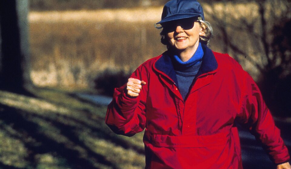 Best Exercises for Seniors Over 75: A Safe Plan That Matches CDC Guidelines Woman power walking outdoors
