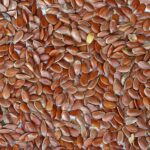 A bowl of brown flaxseeds