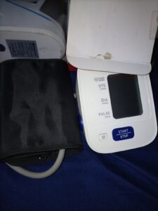 An automatic home blood pressure monitor with its arm cuff
