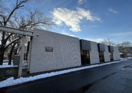 The Social Security Administration office building in downtown Corning, New York, on a winter day with snow along the sidewalk