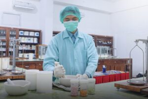 A pharmacist preparing medicines in a pharmacy